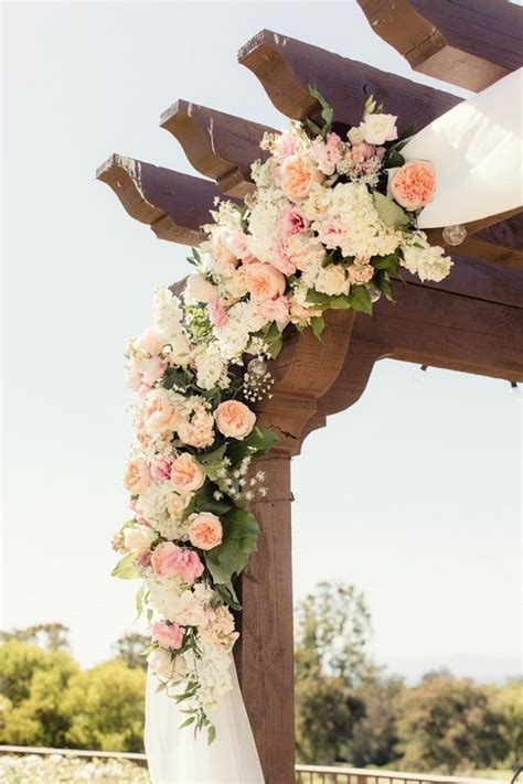5 Unique Ideas To Incorporate Roses Into Your Wedding Decorations Wedding Arch Flowers