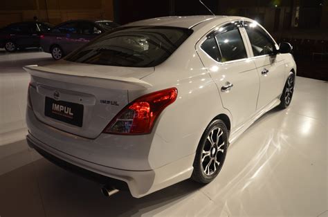 Well, im sad that in malaysia, they have body kits for the versa aka almera but here in the good old usa, we don't have anything. Nissan Sunny launches in Malaysia with Impul body kit ...