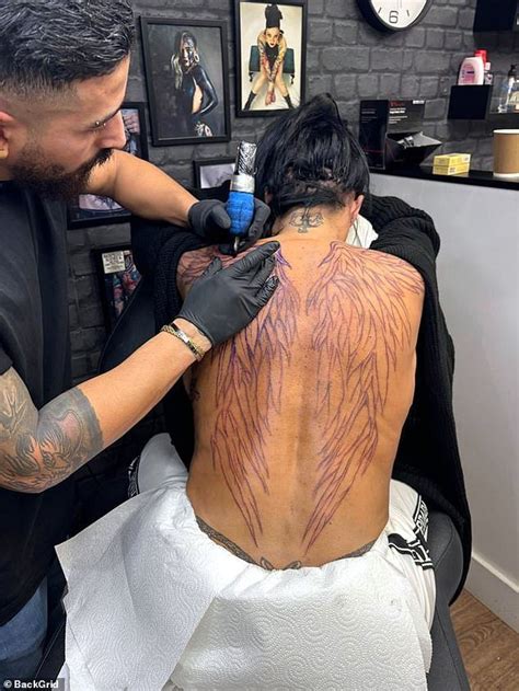 katie price shows off huge new tattoo as former glamour model covers her entire back ny