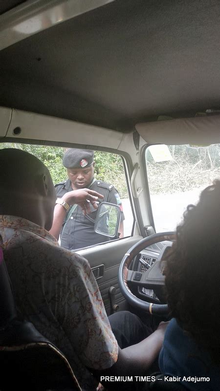 Photos Nigerian Police Officers Caught On Camera Taking Bribe