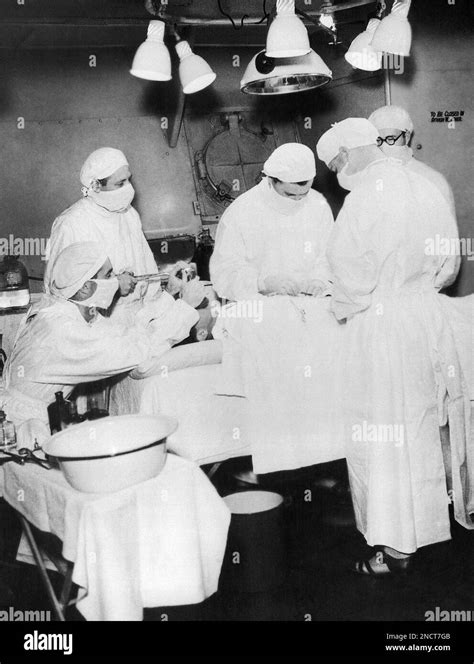 doctors aboard the british cruiser h m s kenya perform an appendectomy on able seaman bruce