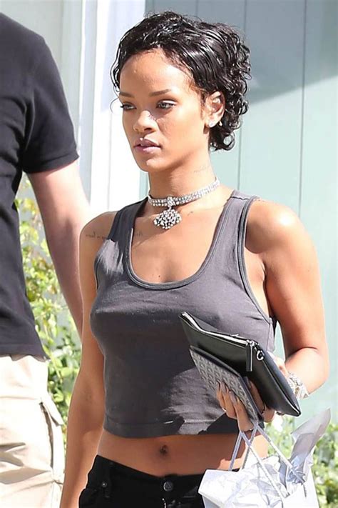 rihanna posts glum new short and curly hairstyle pic to instagram