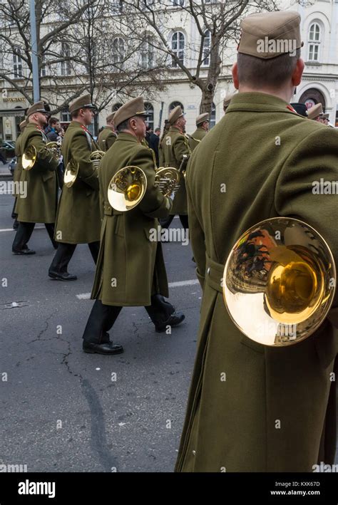 Soldiers March With Trumpets During The 15 March Parade In Budapest