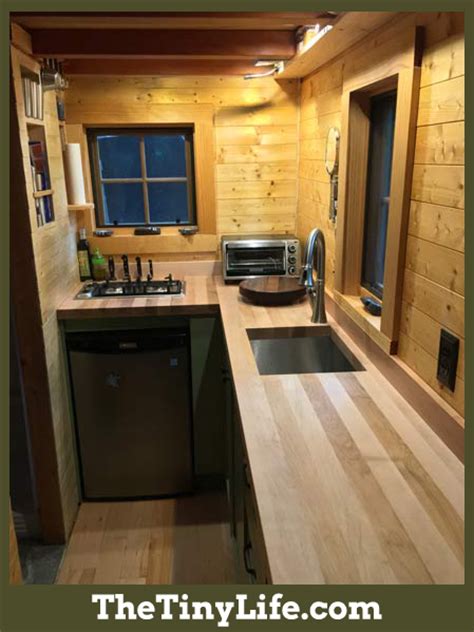 First, try painting small cabinets white. Ryan's Tiny House Kitchen - The Tiny Life
