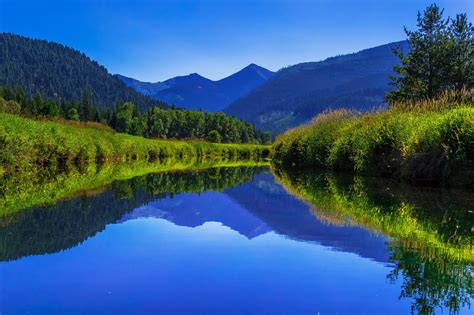 Bull River Reflections Montana By Eric Shuette On
