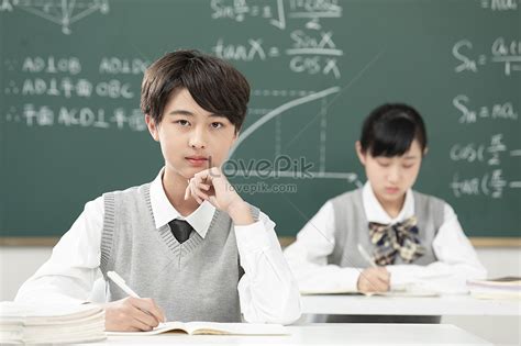 Middle School Students Writing Homework In The Classroom Picture And Hd