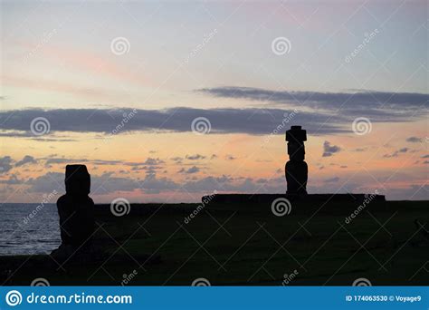 Silhouette Of Some Giant Statues Of Easter Island At Sunset The Moai