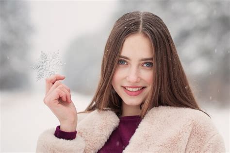 premium photo beautiful girl in winter snowy forest
