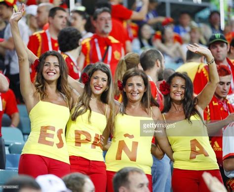 Spanish Football Fans Pose For Photos During The Team S World Cup Group Stage Match Against
