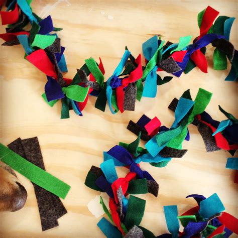 Colorful Streamers Are Scattered On A Wooden Surface