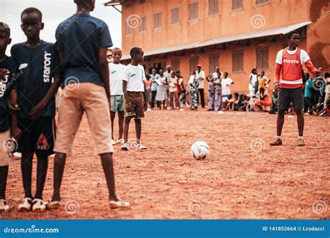 Black African Children Playing Soccer In A Rural Area Editorial Photo