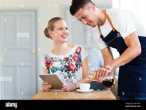 Serving Customer At The Coffee Shop Stock Photo Alamy