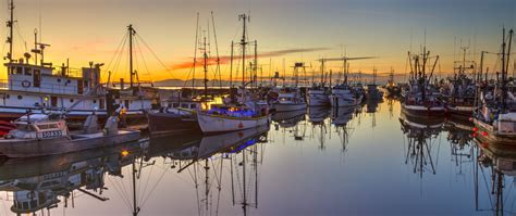 Download Wallpaper 2560x1080 Boats Masts Lake Reflection Sunrise