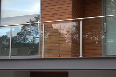Semi Frameless Glass Balustrade With Stainless Steel Posts And Handrail Balcony Glass Design