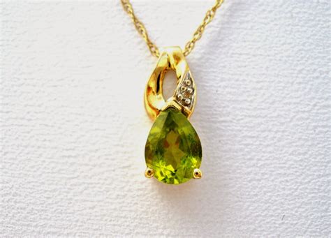 The Jewelry Ladys Store 10k Gold Peridot Pendant And Diamond Necklace