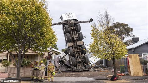 Two People Are Injured After A Crane Crashes Into A Melbourne House
