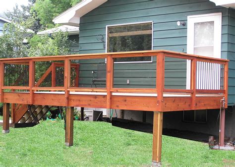 You can add a railing system that matches the material of . 88f7acfdf61421c5d622ad11cdd208e9 | Deck designs backyard ...