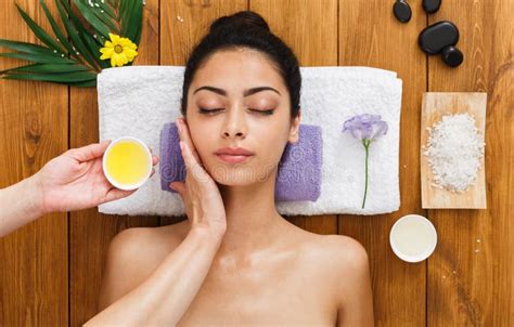 beautician make stone massage spa for woman at wellness center stock image image of healthy