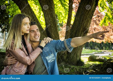 Boyfriend And Girlfriend Standing Showing Romantic Love Stock Image