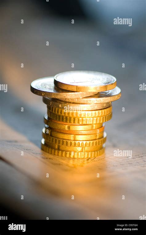 Pile Of Euro Coins On Newspaper Stock Photo Alamy