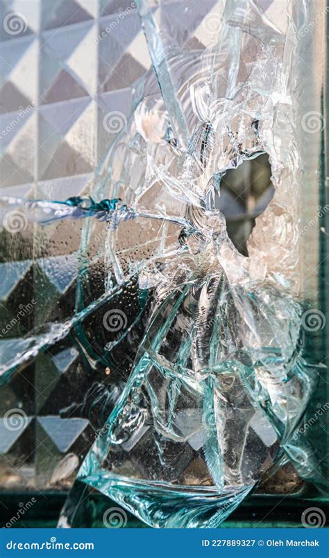 Fragment Of An Old Wall Made Of Cracked Blue Glass Bricks As A Background Texture Stock Image