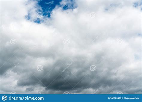 Stormy Cloudy Sky With Patches Of Blue And White Clouds Stock Photo