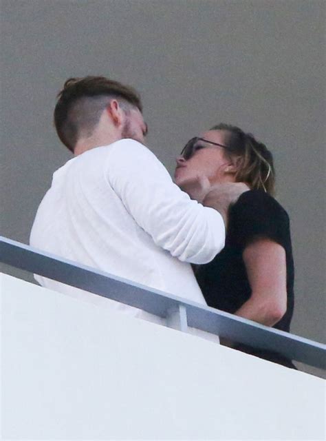 Katie Cassidy Kisses Her Boyfriend On The Balcony Of Her Hotel In Miami