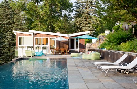 16 Stunning Mid Century Modern Swimming Pool Designs That Will Leave