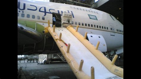 Boeing 747 Emergency Door Slid Raft Deploy At Hangar Back When I Was
