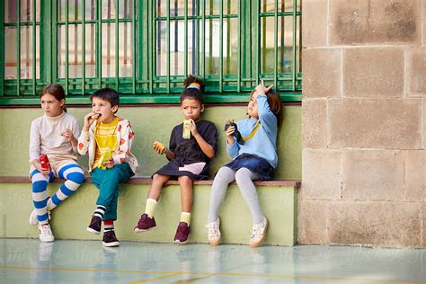 Kids On A School Break By Stocksy Contributor Alto Images Stocksy