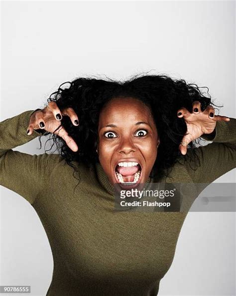 Woman Pulling Silly Face Photos And Premium High Res Pictures Getty Images