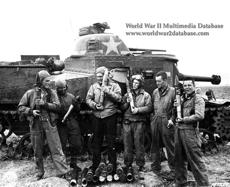 M3 Medium Tank Crew Of 1st Armored Division Displays 75mm Ammunition