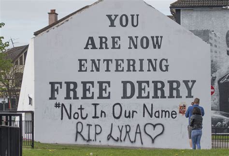 friends of murdered lyra mckee in red hand protest at headquarters of dissident republican group