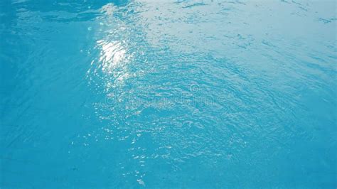 Ripples On The Blue Water In The Pool Water Purification In Swimming