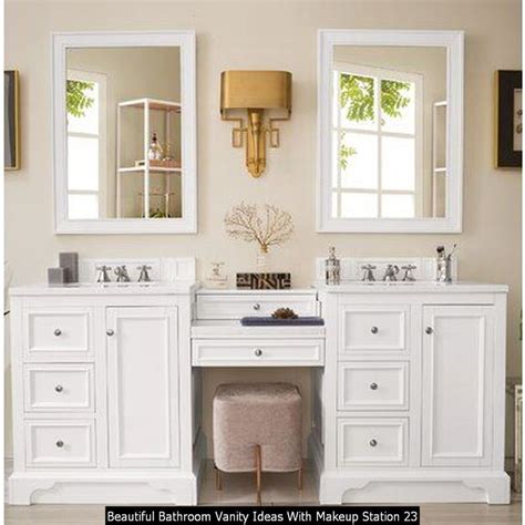 A White Bathroom With Two Sinks And Mirrors