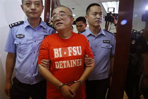 philippines arrests hands over to china corruption fugitive