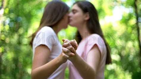 Lesbians Couple Kissing And Holding Hands Trustful Relationship Lgbt Rights Stock Image