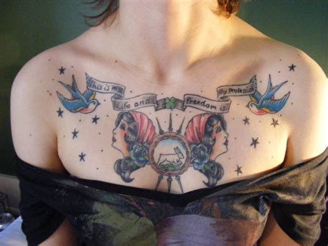 Life And Freedom Chest Piece Tattoo Design For Women