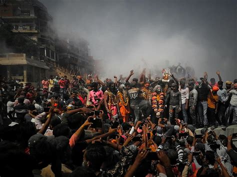 Holi Celebrations At Cremation Ground With Pyre Ashes Photograph By
