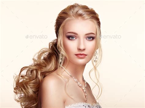 Blonde Girl With Long And Shiny Curly Hair Stock Photo By Heckmannoleg