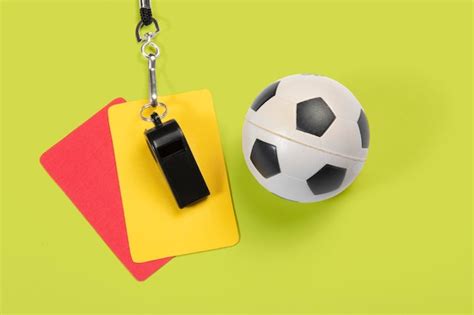 Premium Photo Soccer Ball Yellow And Red Cards And Referee Whistle