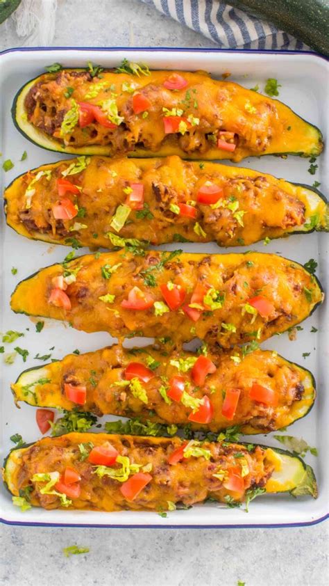 These taco stuffed zucchini boats are so incredible because they not only bring the taco flavors you want, but it's done in a unique fashion. Taco Stuffed Zucchini Boats Video - Sweet and Savory Meals