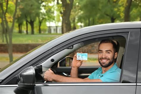 Young Man Holding Driving License Stock Image Image Of Insurance