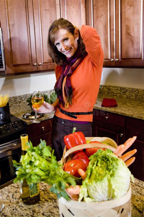 1 source for hot moms, cougars, grannies, gilf, milfs and more. Mature Woman Cooking Pasta. Stock Photo - Image of ...