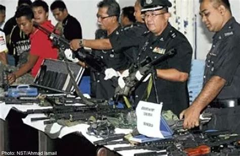 Flight over road in wood. 18 held for playing 'war games' in plantation , Malaysia ...