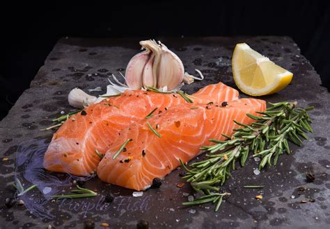 Raw Salmon Fillets With Garlic Lemon Rosemary And Spices Raw Salmon