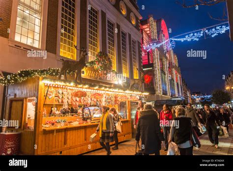 Late night shoppers at traditional Kingston Christmas Market in