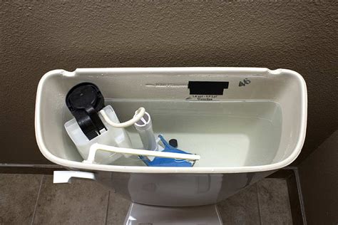 Remove the toilet tank lid and place it away in a safe place where it cannot fall off and break. How to Replace a Toilet Flapper - Toiletology