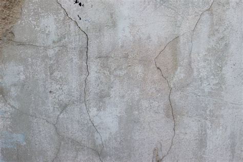 Cement Wall With Cracks Rust And Loose Pieces Dirty Texture Stock