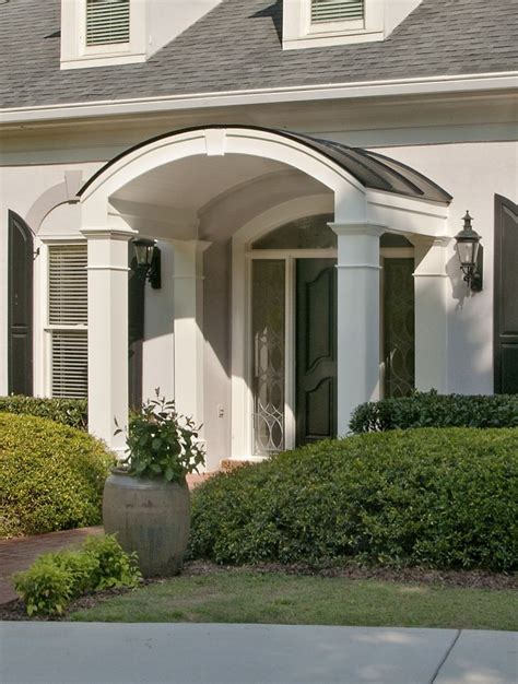 Elegant Arched Portico Addition On French Provincial Home Designed And